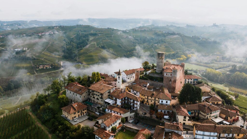 A stunning aerial view of Castiglione Falletto, Italy showcasing its historic vineyards and architecture.